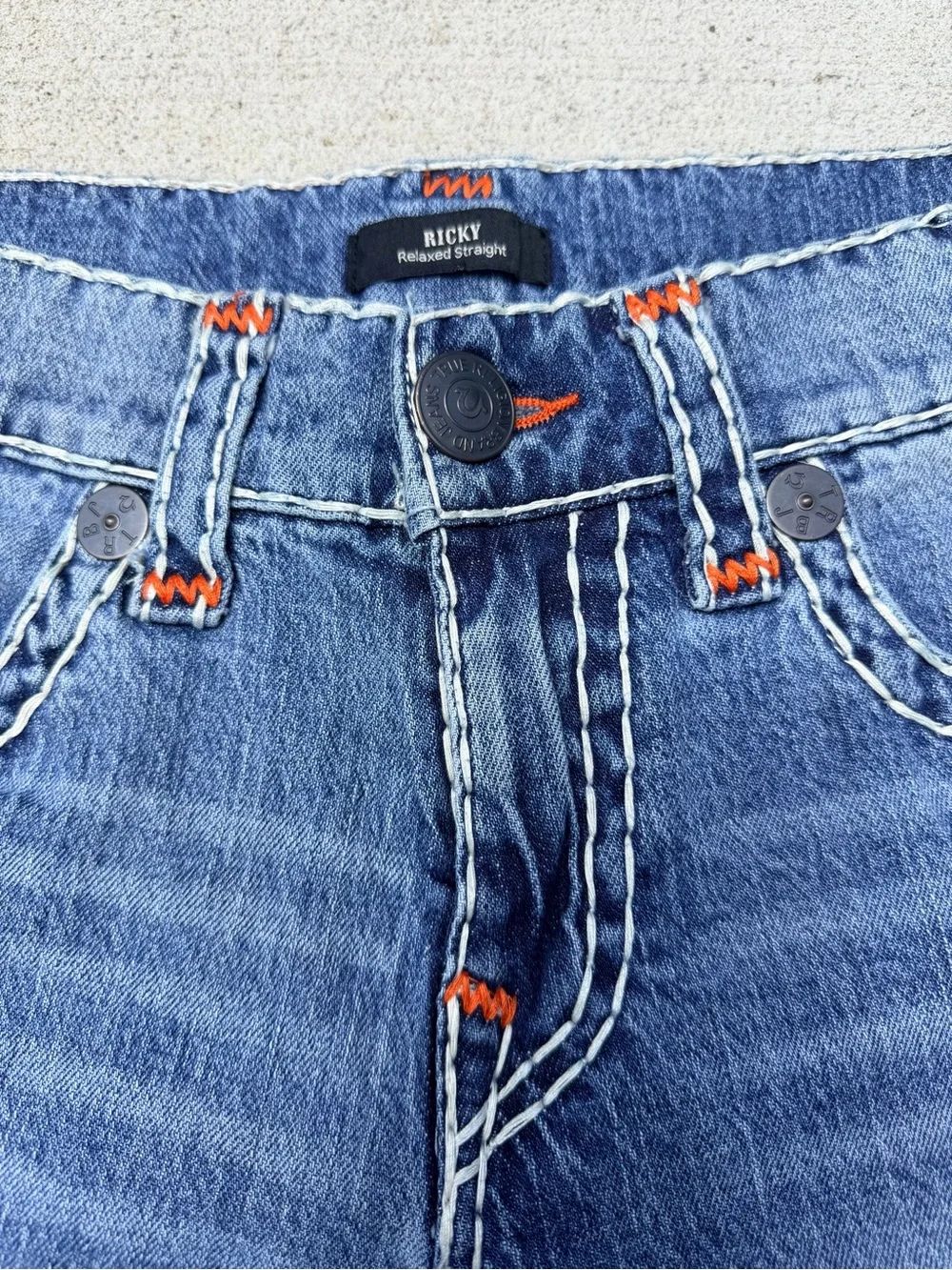 Denim Cutoff Bermuda Shorts in Medium Blue